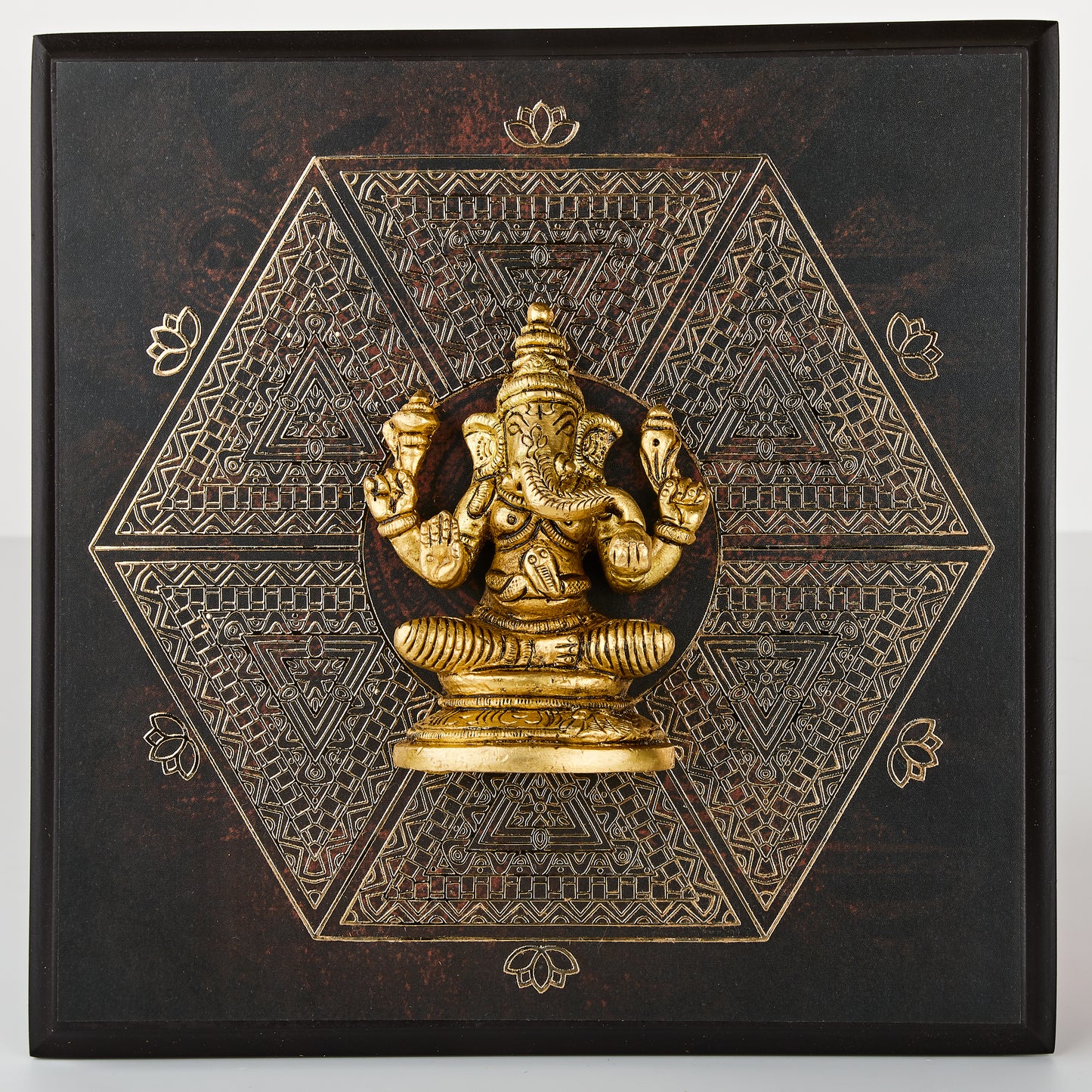 Brass idol backed with 24 carat gold coated metal art