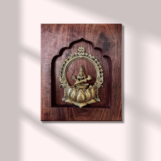 Saraswati Brass Idol on Lotus with Prabhavali – Framed on Sheesham Wood